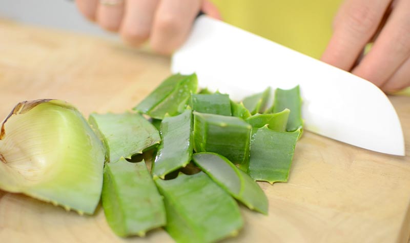 Cutting some pieces of the aloe vera leaf
