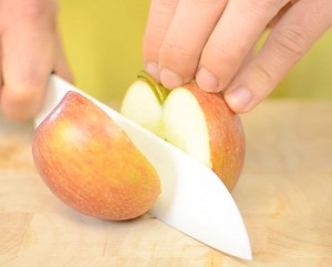 Cutting an apple before juicing